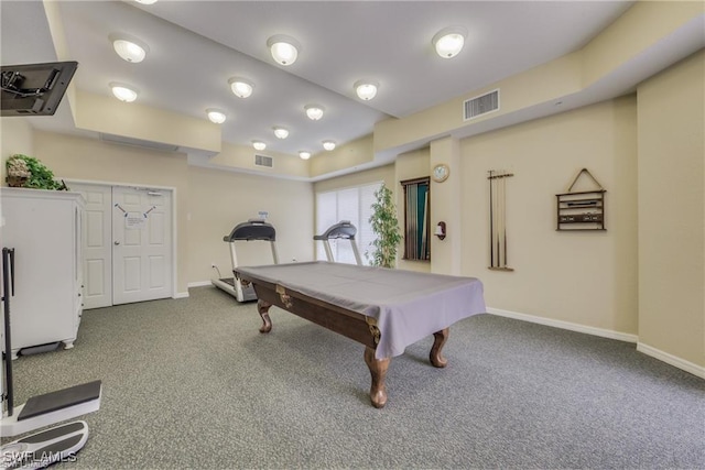 recreation room with carpet, visible vents, and baseboards