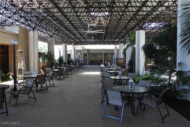 view of patio featuring ceiling fan