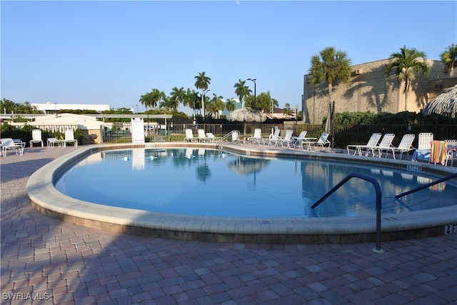 view of swimming pool featuring a patio