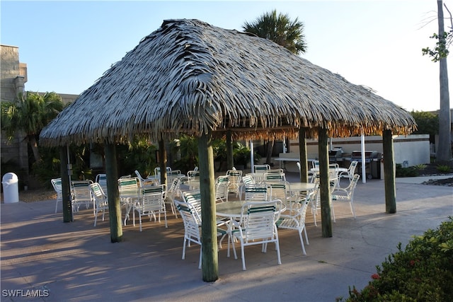 surrounding community with a gazebo and a patio