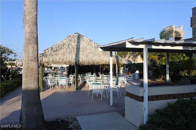 view of property's community with a patio