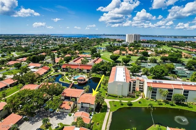 drone / aerial view with a water view