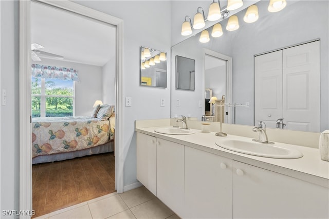 bathroom featuring tile patterned floors and vanity