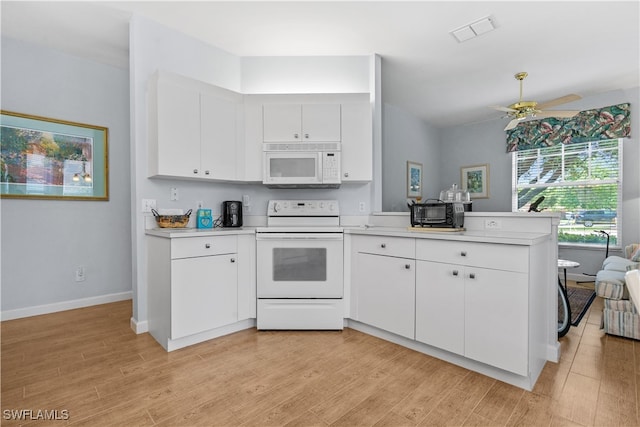 kitchen with ceiling fan, kitchen peninsula, white appliances, white cabinetry, and light hardwood / wood-style flooring