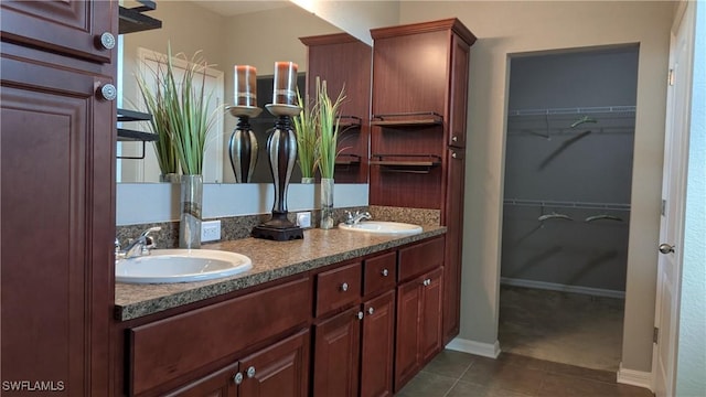 bathroom with vanity and tile patterned floors