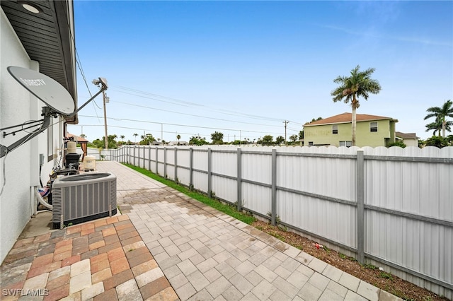 view of patio with central AC