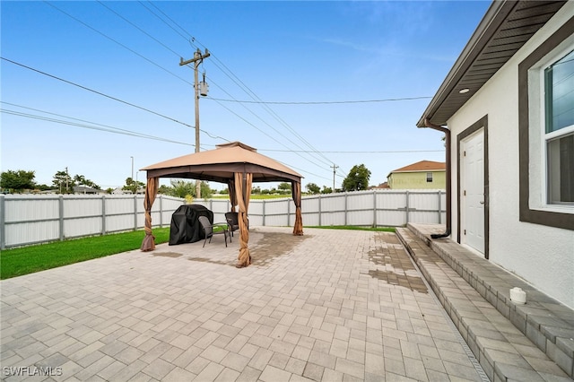 view of patio featuring a gazebo