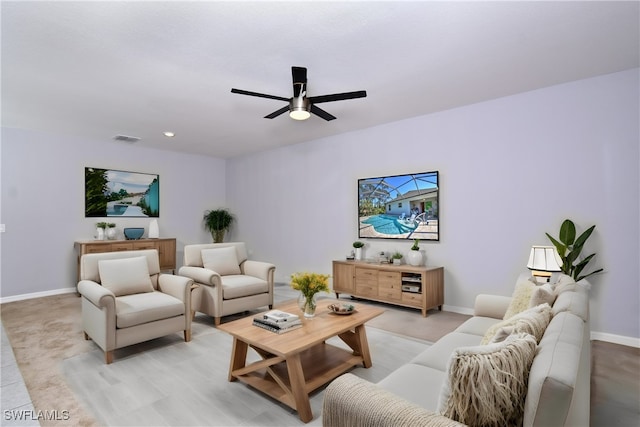 living room with ceiling fan