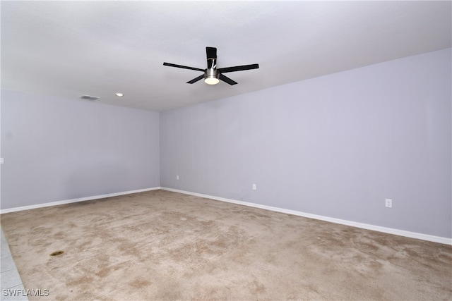 carpeted empty room with ceiling fan