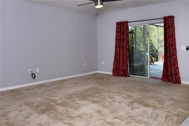 empty room with light carpet and ceiling fan