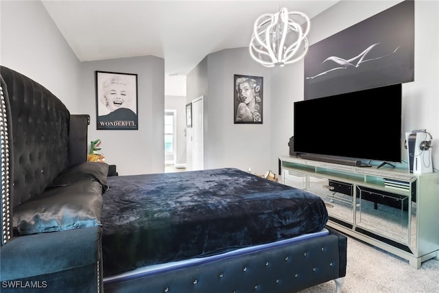 carpeted bedroom featuring vaulted ceiling and an inviting chandelier