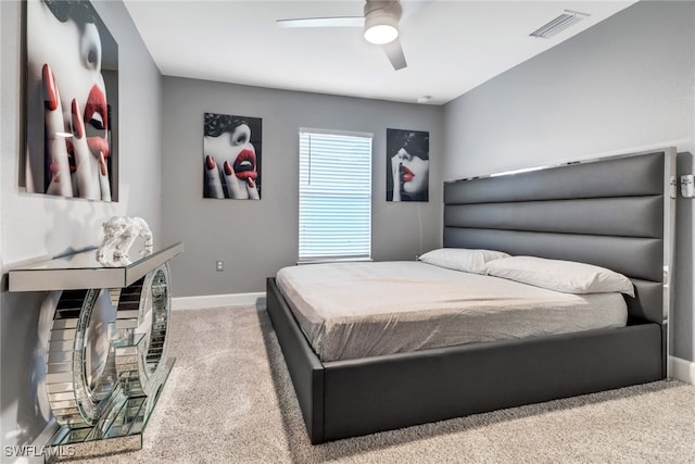 bedroom featuring ceiling fan and light colored carpet