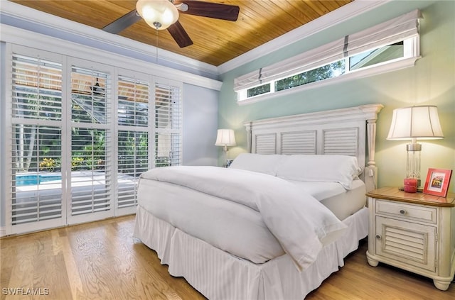 bedroom featuring access to exterior, light wood-type flooring, ornamental molding, ceiling fan, and wooden ceiling