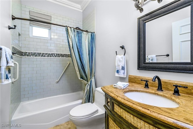 full bathroom with vanity, toilet, crown molding, and shower / tub combo