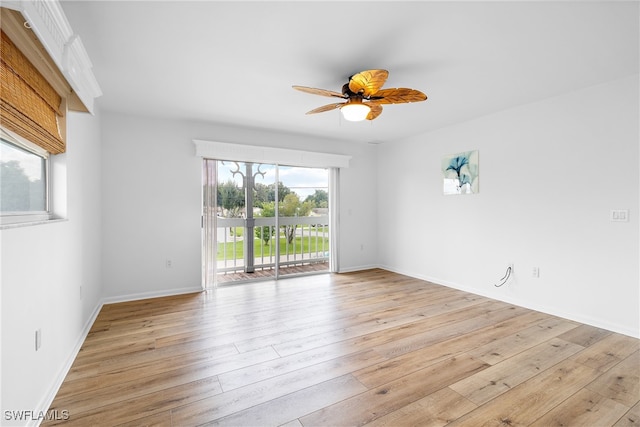 unfurnished room with ceiling fan and light hardwood / wood-style flooring