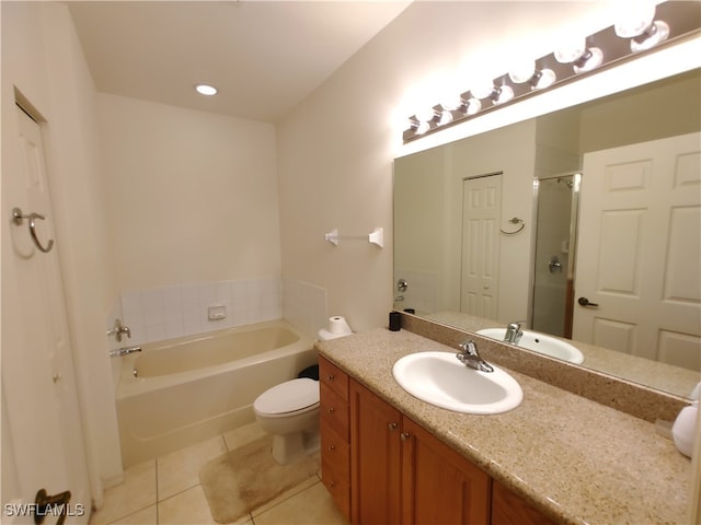 full bathroom featuring tile patterned floors, separate shower and tub, vanity, and toilet