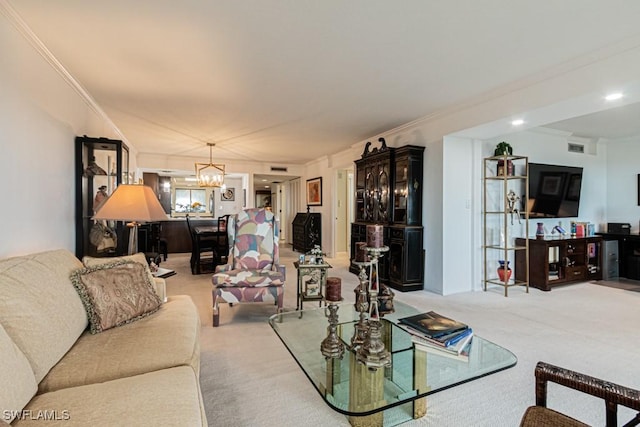 carpeted living room with crown molding and a notable chandelier