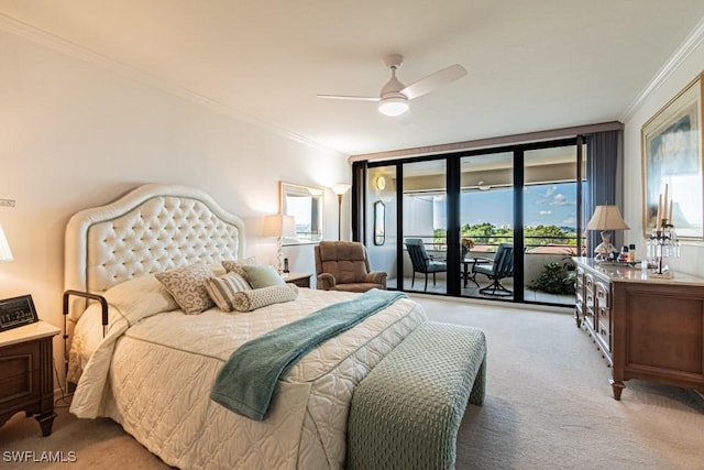 bedroom with light colored carpet, access to outside, ornamental molding, expansive windows, and ceiling fan