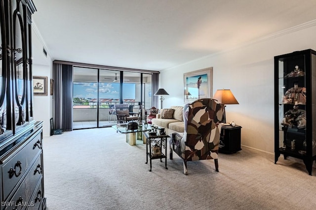 living room with expansive windows, ornamental molding, and light colored carpet