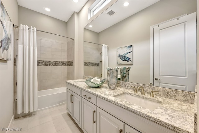 bathroom with vanity, tile patterned floors, and shower / bathtub combination with curtain