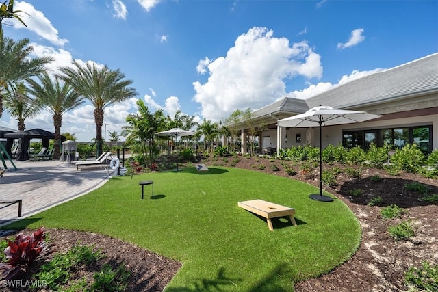 surrounding community featuring a gazebo and a lawn