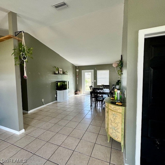 interior space featuring vaulted ceiling