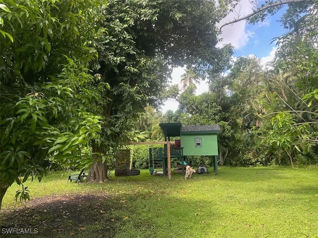 view of yard with a playground