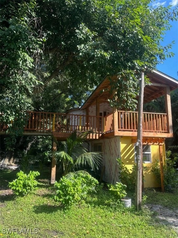 view of yard featuring a deck