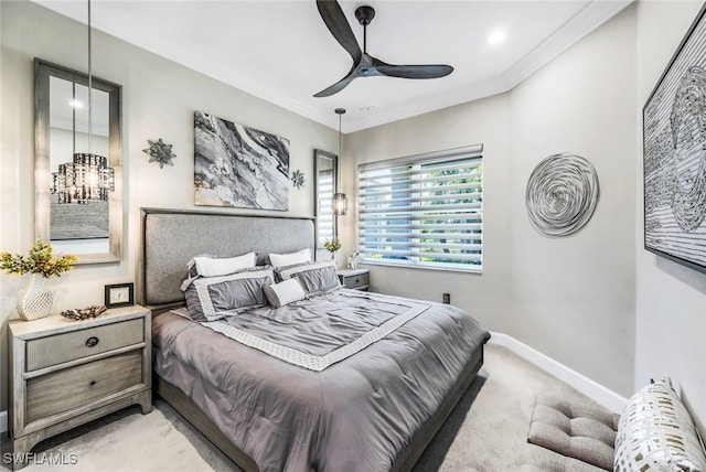 carpeted bedroom with crown molding, radiator heating unit, and ceiling fan