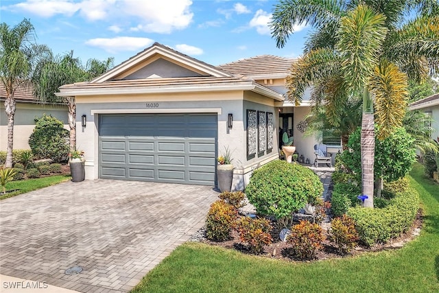 single story home with a garage