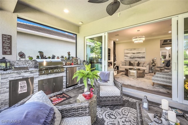 view of patio / terrace featuring ceiling fan, area for grilling, an outdoor hangout area, and grilling area