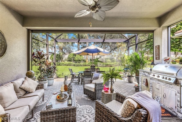 exterior space with a wealth of natural light and ceiling fan