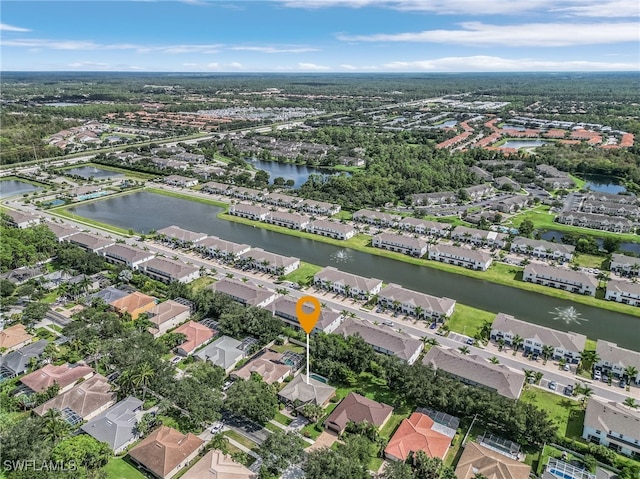 drone / aerial view with a water view