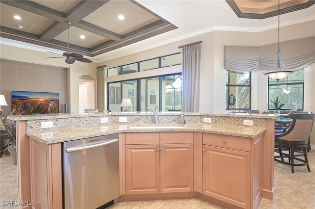 kitchen with sink, coffered ceiling, stainless steel dishwasher, light stone counters, and ornamental molding