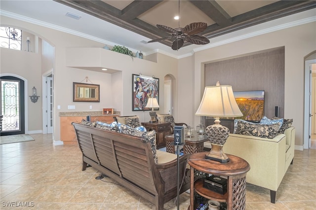 living room featuring beamed ceiling, coffered ceiling, and light tile patterned floors