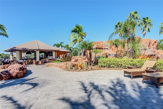 view of property's community featuring a gazebo and a patio area