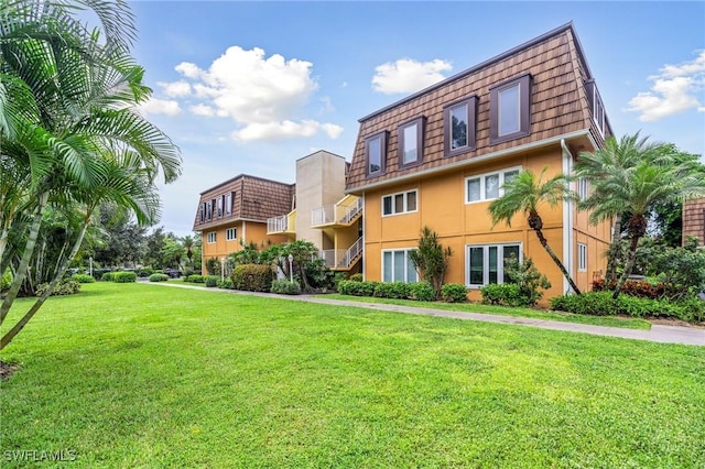 exterior space featuring a front lawn