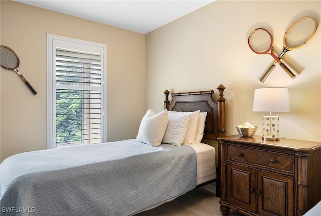 bedroom featuring dark hardwood / wood-style floors