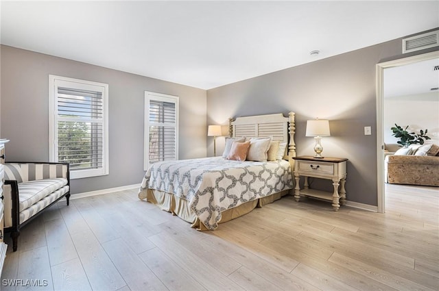 bedroom featuring light hardwood / wood-style flooring