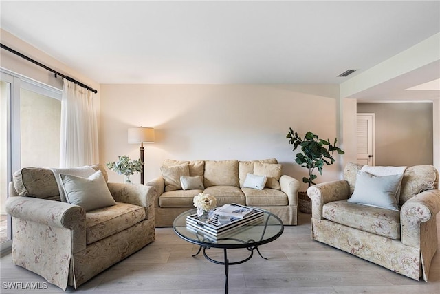 living room featuring light wood-type flooring