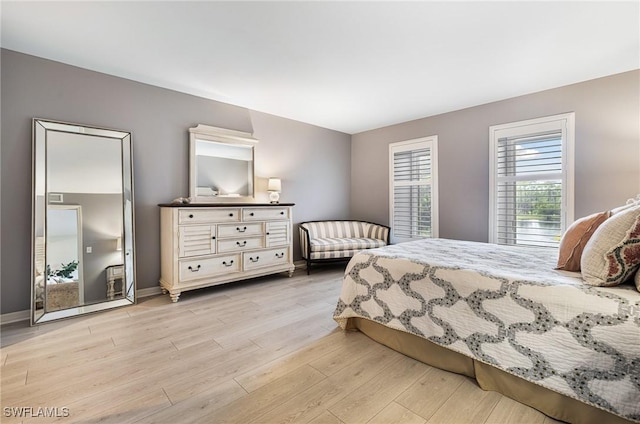 bedroom with light hardwood / wood-style floors