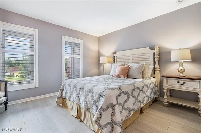 bedroom featuring light wood-type flooring