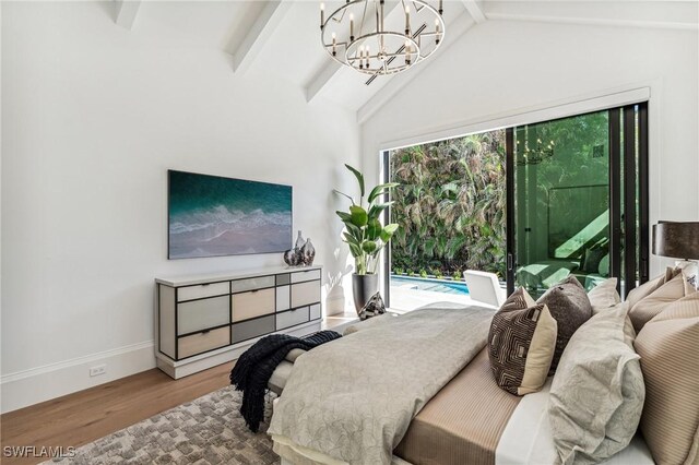 bedroom with an inviting chandelier, beamed ceiling, high vaulted ceiling, hardwood / wood-style floors, and access to outside