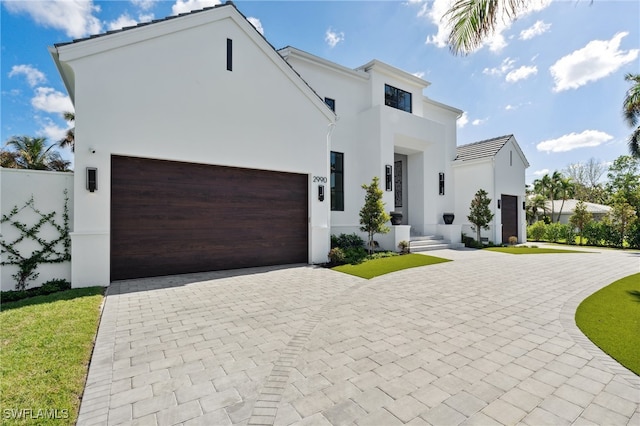 modern home featuring a garage