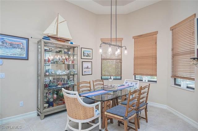 dining room featuring light tile patterned flooring