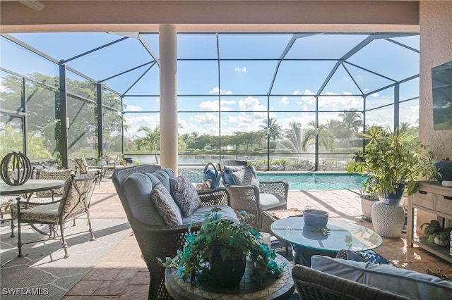 view of patio / terrace featuring glass enclosure