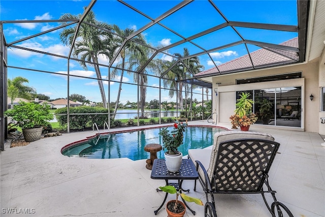 view of pool with glass enclosure and a patio