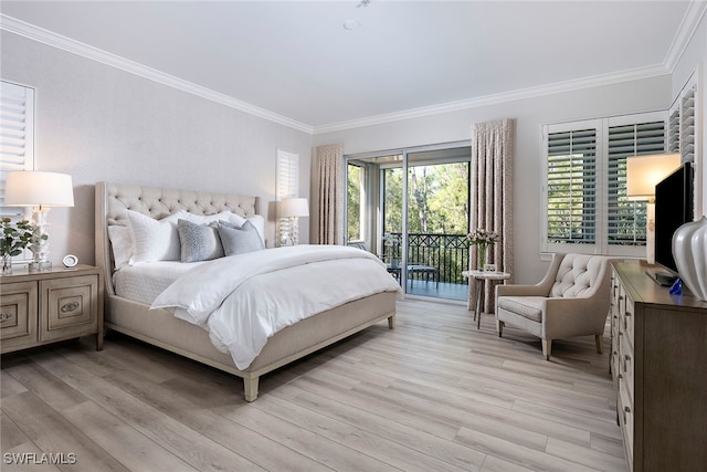 bedroom featuring crown molding, light hardwood / wood-style flooring, and access to exterior