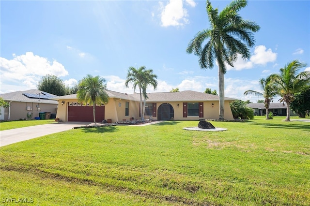 single story home featuring a front yard and a garage