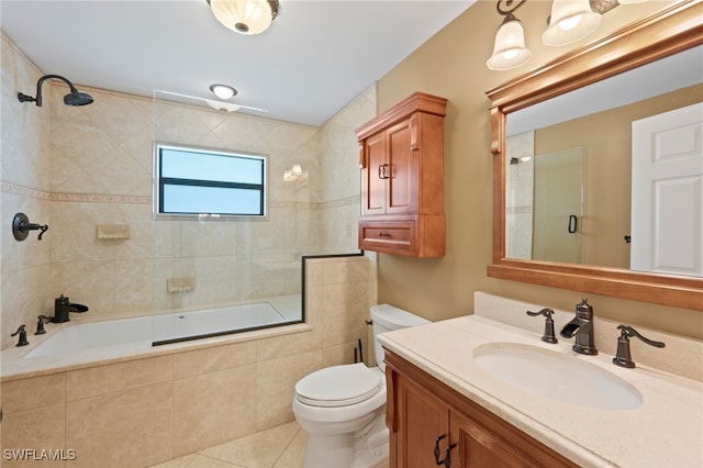 full bathroom with toilet, vanity, tile patterned floors, and shower / bath combination with glass door